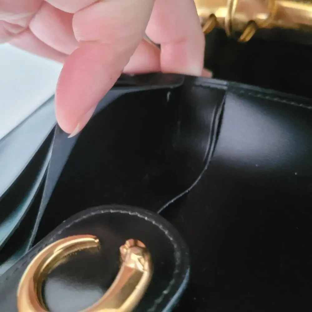 Cartier Black Leather Planner with Gold Panther Accent